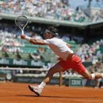 Rafael Nadal of Spain hits a return to Novak Djokovic of Serbia during their men's singles semi-final match at the French Open tennis tournament at the Roland Garros stadium in Paris June 7, 2013. REUTERS/Gonzalo Fuentes