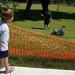 Five-year-old Brady Chapman watches a robot from Kuukulgur team from Estonia compete in NASA's 2013 Sample Return Robot Challenge at the Worcester Polytechnic Institute in Worcester, Massachusetts June 5, 2013. REUTERS/Brian Snyder