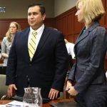 George Zimmerman, left, smiles while standing next to defense counsel Lorna Truettwhile, waiting for the jury to leave the courtroom during the 15th day of his trial in Seminole circuit court, in Sanford, Fla., Friday, June 28, 2013. Zimmerman is charged with second-degree murder for the 2012 shooting death of Trayvon Martin. (AP Photo/Orlando Sentinel, Joe Burbank, Pool)