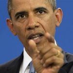 FILE - In this June 19, 2013 file photo, U.S. President Barack Obama gestures during a news conference with German Chancellor Angela Merkel at the German Chancellery in Berlin. In the shifting narrative of the Obama administration, Edward Snowden, the man whose leaks of top-secret material about government surveillance programs have tied the national security apparatus in knots and brought charges under the Espionage Act, has now been demoted to a common fugitive unworthy of international intrigue or extraordinary pursuit by the U.S. government. (AP Photo/Evan Vucci, File)