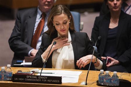 United Nations High Commissioner for Refugees (UNHCR) special envoy, actress Angelina Jolie, listens during a United Nations Security Council meeting on women, peace, security, and sexual violence in conflict at United Nations Headquarters in New York June 24, 2013. REUTERS/Lucas Jackson