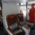 People sit onboard an Aeroflot Airbus A330 heading to the Cuban capital Havana at Moscow's Sheremetyevo airport June 27, 2013. REUTERS/Maxim Shemetov