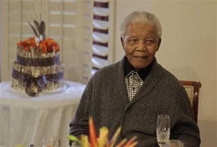 FILE - In this Wednesday, July 18, 2012 file photo, former South African President Nelson Mandela as he celebrates his 94th birthday with family in Qunu, South Africa.  Nelson Mandela's health has deteriorated and he is now in critical condition, the South African government said Sunday, June 23, 2013. The office of President Jacob Zuma said in a statement that he had visited the 94-year-old anti-apartheid leader at a hospital on Sunday evening and was informed by the medical team that Mandela's condition had become critical in the past 24 hours. (AP Photo/Schalk van Zuydam, File)