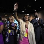 Hazel Dukes, a member of the board of directors of the National Association for the Advancement of Colored People (NAACP), cheers at the end of a speech by NAACP president Benjamin Jealous to the 2013 NAACP convention in Orlando, Florida July 15, 2013. In the wake of the George Zimmerman murder trial, civil rights leaders, including Jealous, are urging the Justice Department to pursue federal civil rights charges against Zimmerman. REUTERS/David Manning (UNITED STATES - Tags: POLITICS TPX IMAGES OF THE DAY)