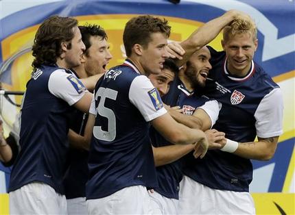 United States' Brek Shea, right, celebrates with teammates after scoring a goal during the second half of the CONCACAF Gold Cup final soccer match against Panama at Soldier Field, Sunday, July 28, 2013, in Chicago. United States won 1-0. (AP Photo/Nam Y. Huh)