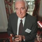 FILE - In this April 9, 1997 file photo, Doug Engelbart, inventor of the computer mouse and winner of the half-million dollar 1997 Lemelson-MIT prize, poses with the computer mouse he designed, in New York. Engelbart has died at the age of 88. The cause of death wasn't immediately known. (AP Photo/Michael Schmelling, File)