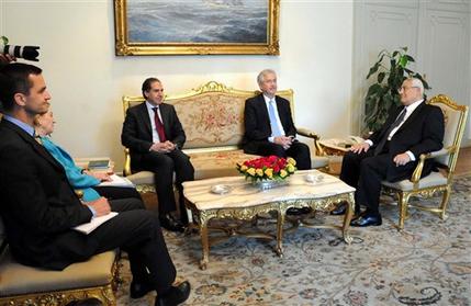 This image released by the office of the Egyptian Presidency shows U.S. Deputy Secretary of State William Burns, center, meeting with Egypt's interim President Adly Mansour, right, as U.S. ambassador to Egypt Anne Patterson listens in, second left, at the presidential palace in Cairo, Monday, July 15, 2013. The senior U.S. diplomat held talks Monday with Egypt's interim leaders as well as the head of the military in the highest level visit by an American official since the Egyptian army ousted the country's first democratically elected leader. The two-day visit by Burns to Cairo comes nearly two weeks after Islamist President Mohammed Morsi was overthrown by the military following days of mass protests. Washington has been sharply criticized by both Morsi's supporters and opponents for what each side perceives as support for their rival's position. (AP Photo/Egyptian Presidency)