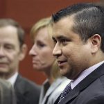 George Zimmerman leaves court with his family after Zimmerman's not guilty verdict was read in Seminole Circuit Court in Sanford, Fla. on Saturday, July 13, 2013. Jurors found Zimmerman not guilty of second-degree murder in the fatal shooting of 17-year-old Trayvon Martin in Sanford, Fla. (AP Photo/Joe Burbank, Pool)