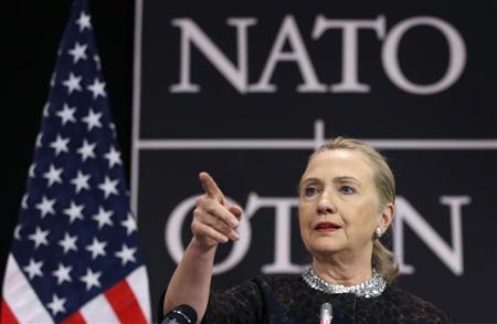 U.S. Secretary of State Hillary Clinton gestures as she addresses a news conference during a NATO foreign ministers meeting at the Alliance headquarters in Brussels December 5, 2012. REUTERS/Francois Lenoir