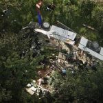 A damaged coach is seen after a crash near the southern town of Avellino July 29, 2013. REUTERS/Ciro De Luca