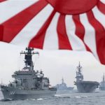 FILE - In this Oct. 14, 2012 file photo, Japan Maritime Self-Defense Force (JMSDF) escort ship Kurama, left, leads other vessels during a fleet review in waters off Sagami, south of Tokyo. A convincing victory of the July 21 upper house election could embolden Prime Minister Shinzo Abe and his staunch backers within the ruling Liberal Democratic Party to push their nationalist agenda, including laying the groundwork for revising Japans pacifist constitution, promoting traditional family values and making changes to the education system to instill more patriotism in students. Abe has called the current history curriculum self-abusive and too apologetic to Asian neighbors over Japans wartime actions. (AP Photo/Itsuo Inouye)