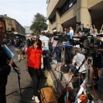 Members of the broadcast media give live reports across from St. Mary's Hospital exclusive Lindo Wing in London, Monday, July 22, 2013. Buckingham Palace officials say Prince William's wife, Kate, has been admitted to the hospital in the early stages of labour.Royal officials said that Kate traveled by car to St. Mary's Hospital in central London. Kate _ also known as the Duchess of Cambridge _ is expected to give birth in the private Lindo Wing of the hospital, where Princess Diana gave birth to William and his younger brother, Prince Harry.The baby will be third in line for the British throne _ behind Prince Charles and William _ and is anticipated eventually to become king or queen. (AP Photo/Lefteris Pitarakis)