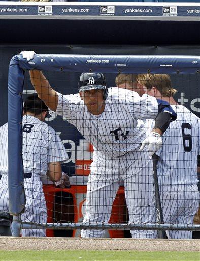 New York Yankees' Alex Rodriquez stretches before batting in the fourth inning for the Tampa Yankees against the Dunedin Blue Jays in a minor league rehab game in Tampa, Fla., Wednesday, July 10, 2013. (AP Photo/Scott Iskowitz)