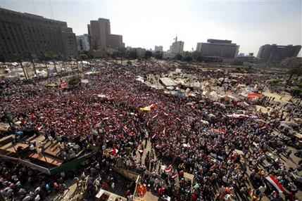 Opponents of Egypt's Islamist President Mohammed Morsi shout slogans during a protest in Tahrir Square in Cairo, Egypt, Wednesday, July 3, 2013. Egypt's military moved to tighten its control on key institutions Wednesday, even putting officers in the newsroom of state TV, in preparation for an almost certain push to remove the country's Islamist president when an afternoon ultimatum expires.(AP Photo/Amr Nabil)