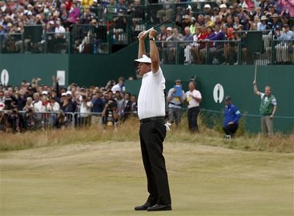 Phil Mickelson of the United States celebrates after his final putt on the 18th green during the final round of the British Open Golf Championship at Muirfield, Scotland, Sunday July 21, 2013. (AP Photo/Jon Super)