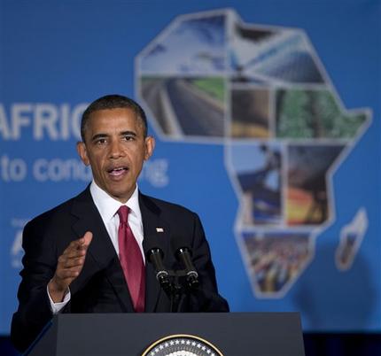 President Barack Obama gestures while speaking at a business forum aimed at increasing investment in Africa, Monday, July 1, 2013, in Dar Es Salaam, Tanzania. The president is traveling in Tanzania on the final leg of his three-country tour in Africa. (AP Photo/Evan Vucci)
