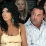 FILE - This Sept. 13, 2009 file photo originally released by Oral-B Pulsonic shows "Real Housewives of New Jersey" stars, Teresa Giudice, left, and her husband Joe Giudice at the Caravan Fashion Show sponsored by Oral-B Pulsonic in New York. Teresa and Giuseppe Joe Giudice were charged in a 39-count indictment handed up Monday, July 29, 2013, in Newark, N.J. The two are accused of submitting fraudulent mortgage and other loan applications from 2001 through 2008, a year before their show debuted on Bravo. Prosecutors say they made false claims about their employment status and salaries. (AP Photo/Oral-B Pulsonic, Gary He)