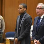 Singer Chris Brown and attorney Mark Geragos (R) attend a probation progress hearing in Los Angeles Superior Court July 15, 2013. REUTERS/Alberto E. Rodriguez/Pool