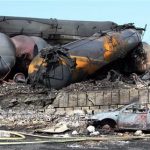 This photo provided by Surete du Quebec, shows wrecked oil tankers and debris from a runaway train on Monday, July 8, 2013 in Lac-Megantic, Quebec, Canada. A runaway train derailed igniting tanker cars carrying crude oil early Saturday, July 6. At least thirteen people were confirmed dead and nearly 40 others were still missing in a catastrophe that raised questions about the safety of transporting oil by rail instead of pipeline. (AP Photo/Surete du Quebec, The Canadian Press)