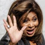 U.S. singer Tina Turner waves during a photocall before the Emporio Armani Autumn/Winter 2011 women's collection show at Milan Fashion Week February 26, 2011. REUTERS/Stefano Rellandini