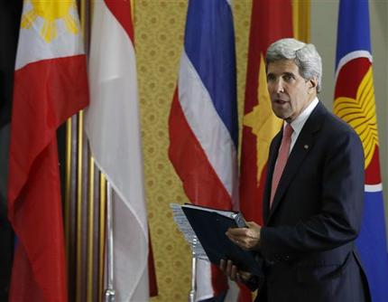 U.S. Secretary of State John Kerry arrives for a press conference at the ASEAN meeting in the International Conference Center in Bandar Seri Begawan, Brunei, Monday, July 1, 2013. Kerry swapped his Mideast peace portfolio for issues in emerging Southeast Asia and road bumps in U.S. relations with Russia and China when he landed Monday in Brunei for a regional security conference. (AP Photo/Vincent Thian)