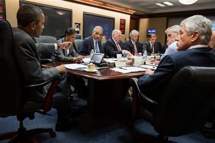 In this July 3, 2013 photo provided by the White House, President Barack Obama, left, meets with members of his national security team to discuss the situation in Egypt in the Situation Room of the White House in Washington. While the Obama administration throws its support behind Egypts military, some members of Congress are looking at withholding some or all of Americas annual $1.5 billion aid package if a civilian government isnt quickly restored. (AP Photo/White House Photo, Pete Souza)