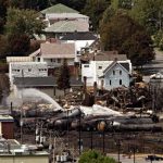 Wreckage is strewn through the downtown core in Lac-Megantic, Quebec, Monday, July 8, 2013, after a train derailed, igniting tanker cars carrying crude oil early Saturday. (AP Photo/The Canadian Press, Ryan Remiorz)