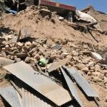 In this July 22, 2013 photo released by Xinhua News Agency, a damaged house stands in rubble following an earthquake that hit Majiagou Village of Minxian County, northwest China's Gansu Province. A strong earthquake struck near the surface in a dry, hilly farming area in western China early Monday, killing at least 54 people, injuring nearly 300, and shattering thousands of homes, the local government said. (AP Photo/Xinhua, Tu Guoxi) NO SALES