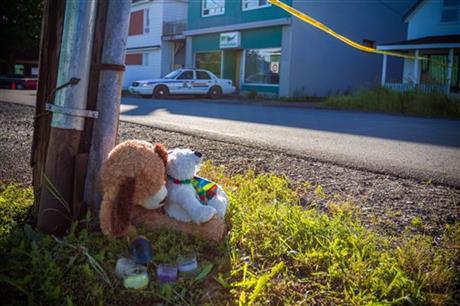 A memorial sits outside the Reptile Ocean exotic pet store in Campbellton