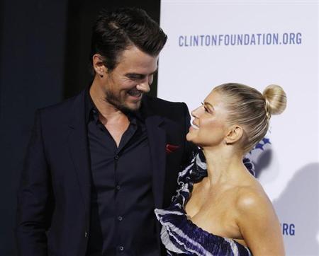 Actor Josh Duhamel and his wife singer Fergie arrive at The Clinton Foundation Gala in celebration of "Decade of Difference" in Los Angeles