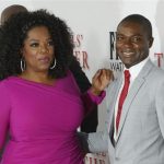 Actors David Oyelowo and Oprah Winfrey, cast members of the film "Lee Daniels' The Butler", pose at the film's premiere in Los Angeles
