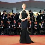 Actress Mia Wasikowska poses during a red carpet at the 70th Venice Film Festival in Venice