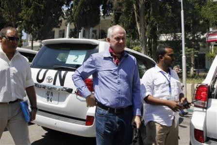 Sellstrom, head of U.N. chemical weapons investigation team, stands outside Yousef al-Azma military hospital in Damascus