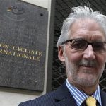 British Cycling President Brian Cookson poses in front of the building where the International Cycling Union was founded in Paris