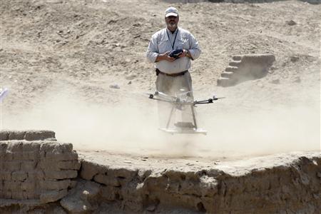 Castillo, a Peruvian archaeologist with Lima's Catholic University and an incoming deputy culture minister, flies a drone to take pictures of the archaeological site of San Jose de Moro in Trujillo