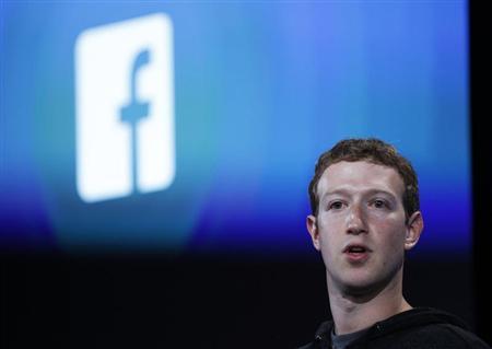 Mark Zuckerberg, Facebook's co-founder and chief executive introduces 'Home' a Facebook app suite that integrates with Android during a Facebook press event in Menlo Park, California, April 4, 2013. REUTERS/Robert Galbraith
