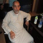 Egyptian Interior Ministry handout shows Muslim Brotherhood leader Mohammed Badie at a police station after being arrested by security forces in Cairo