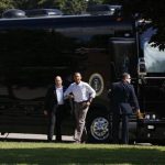 U.S. President Barack Obama steps off his bus upon his arrival at Tully Central High School in Tully, New York
