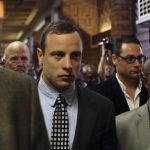 Oscar Pistorius leaves after court proceedings at the Pretoria Magistrates court