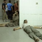 People, affected by what activists say was a gas attack, are treated at a medical center in the Damascus suburb of Saqba