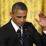 U.S. President Obama waves before departing a news conference in the East Room of the White House in Washington