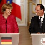 France's President Francois Hollande (R) and German Chancellor Angela Merkel attend a joint news conference at the Elysee Palace in Paris, May 30, 2013. REUTERS/Charles Platiau