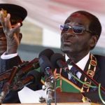 Zimbabwe's President Mugabe addresses the crowd gathered to commemorate Heroes Day in Harare