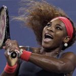Serena Williams of the U.S. watches her backhand to Schiavone of Italy at the U.S. Open tennis championships in New York
