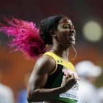 Shelly-Ann Fraser-Pryce of Jamaica celebrates winning the women's 100 metres final during the IAAF World Athletics Championships at the Luzhniki stadium in Moscow August 12, 2013. REUTERS/Dylan Martinez
