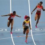Fraser-Pryce of Jamaica celebrates winning the women's 100 metres final during the IAAF World Athletics Championships in Moscow
