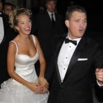 Canadian singer Buble and his bride Argentine actress Lopilato pose for photographers after their religious wedding ceremony in Marcos Paz