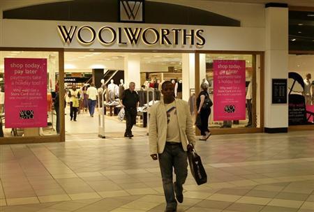 A man leaves a Woolworths shop in Sandton