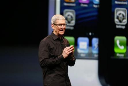 File photo of Apple Inc. CEO Tim Cook taking the stage after the introduction of the iPhone 5 during Apple Inc.'s iPhone media event in San Francisco