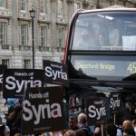 Protestors block Whitehall during a rally against the proposed attack on Syria in central London